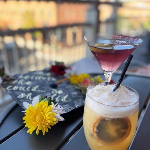 Zane Grey Bar balcony overlooking Historic Downtown Flagstaff from the Weatherford Hotel.